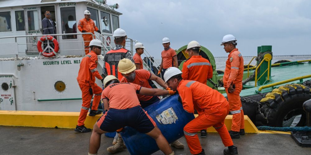 Race against time to clear oil spill in Philippines as Typhoon Gaemi wreaks havoc in Asia