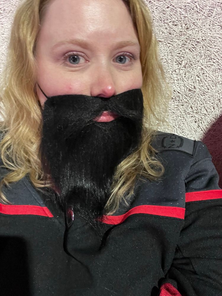 Pic of me wearing a long black beard.