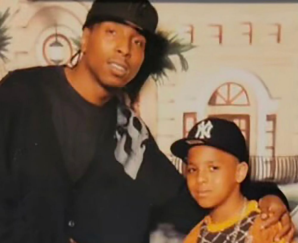 Robert Brooks with his son in an undated photo.