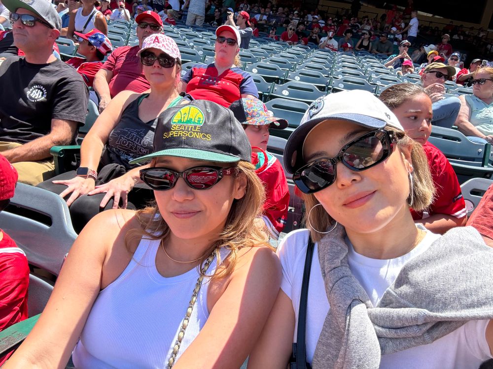 two seattle homies cheering the mariners at angel stadium