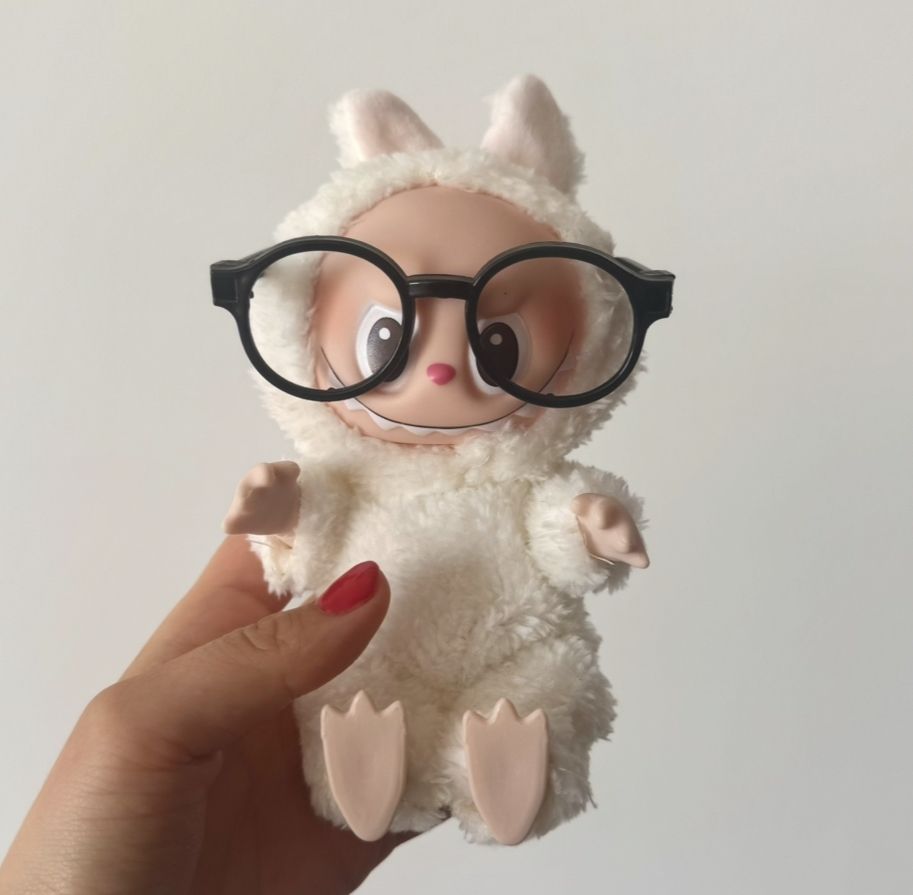  labubu with black framed glasses