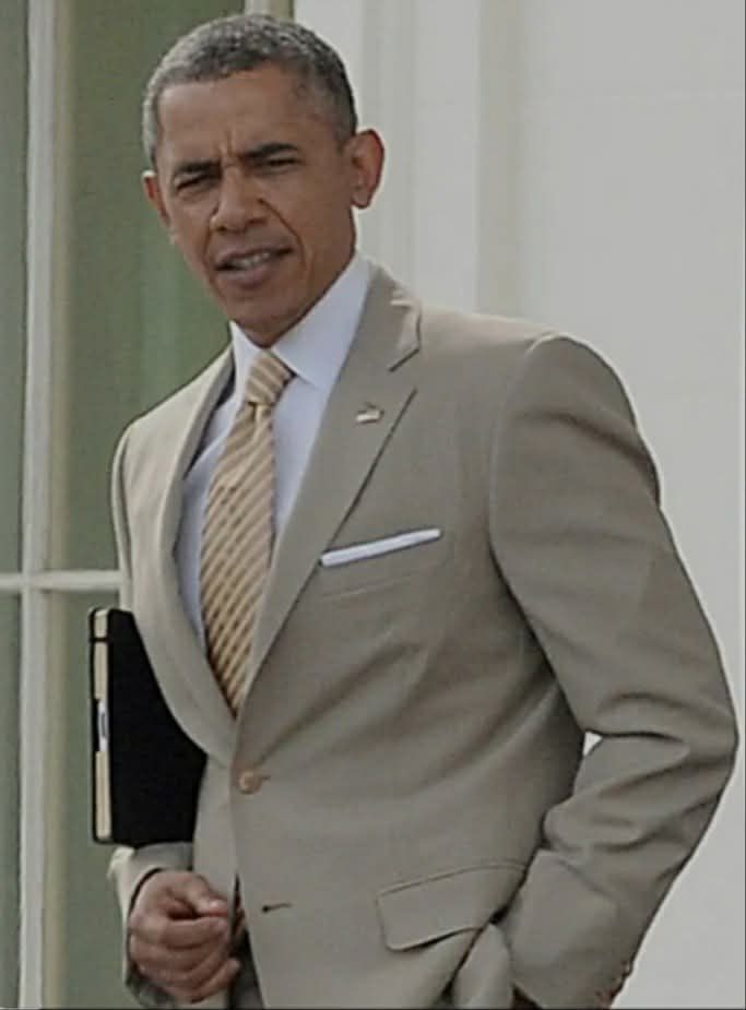 President Obama wearing a tan suit

