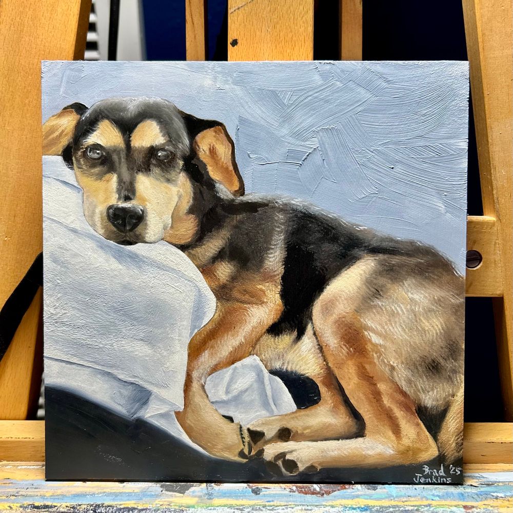 An oil painting of a small black and tan dog lying on bedding