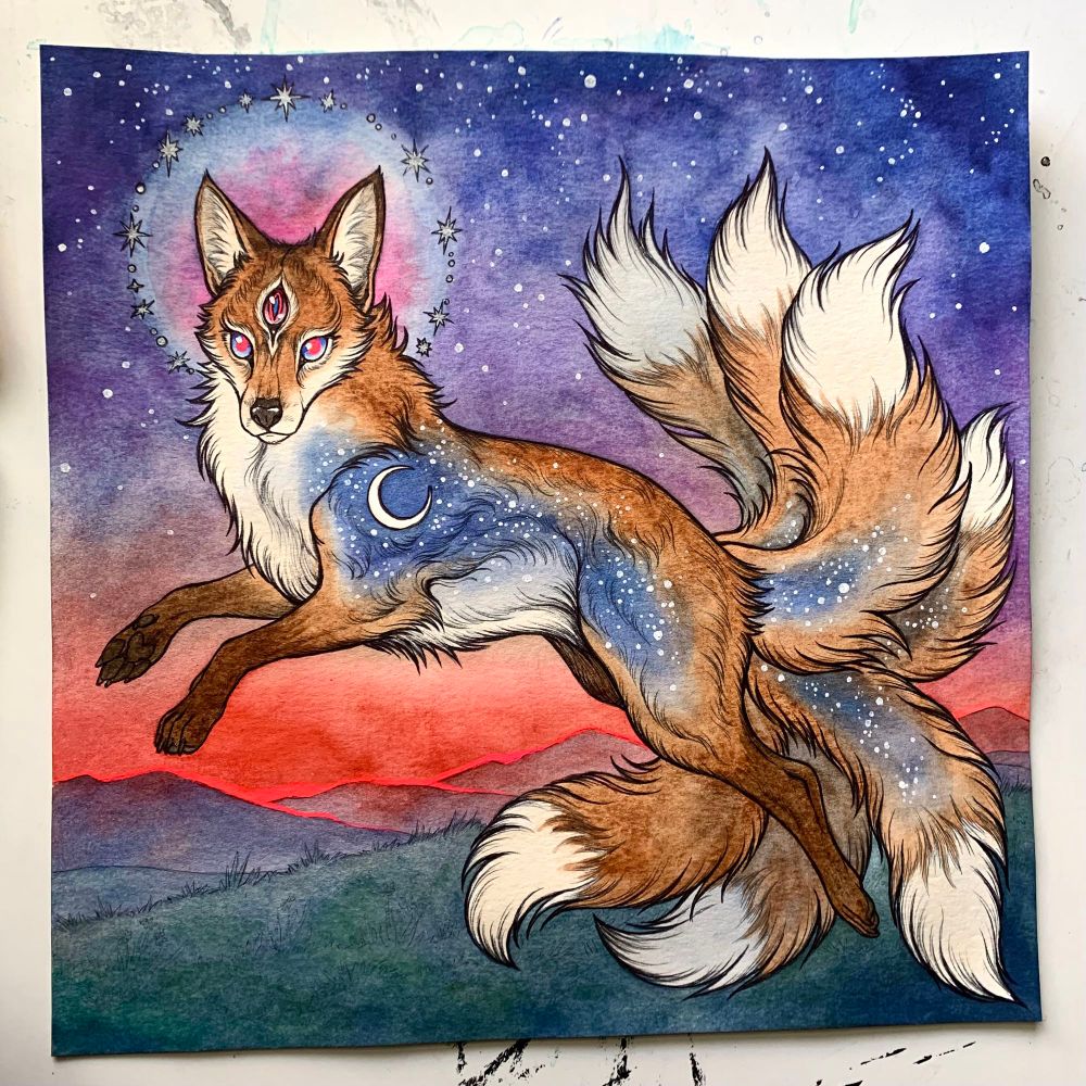 A watercolor painting of a red fox with 7 tails, a halo of silver stars, and three eyes. Its body is full of stars, it is leaping into a sunset colored sky 