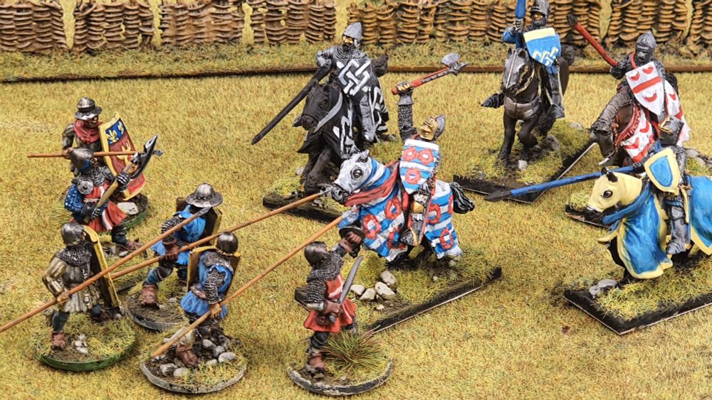English knights charging French spearmen - 28mm painted wargames figures.