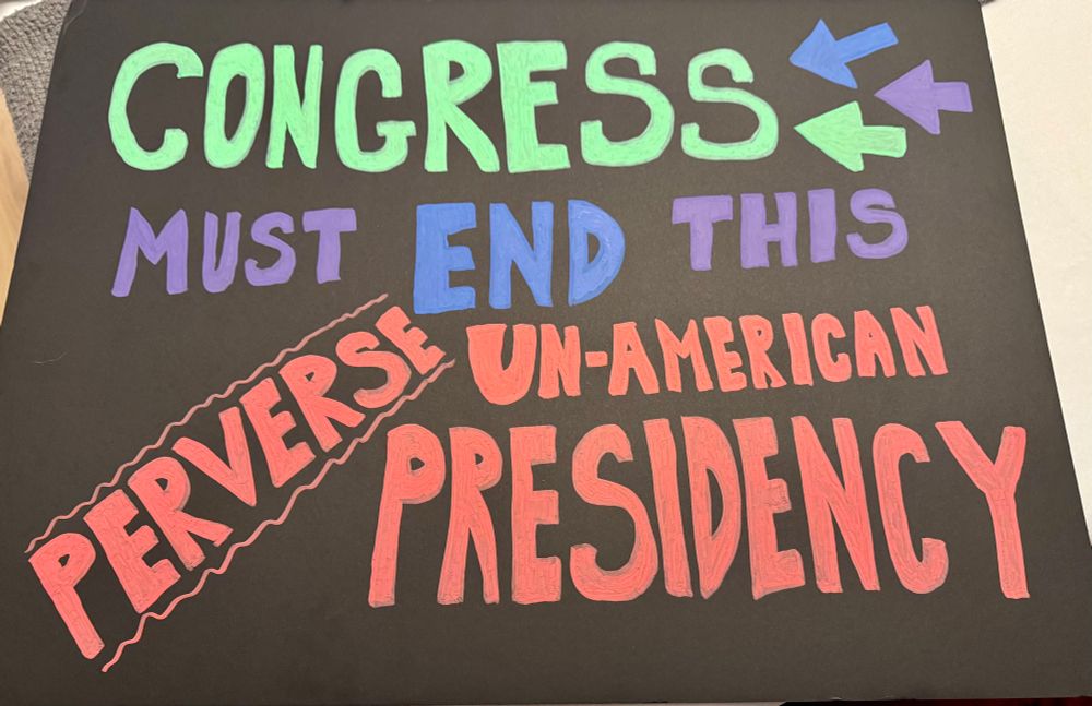 June 14 protest sign: “—>Congress<— must end this perverse, un-American presidency”