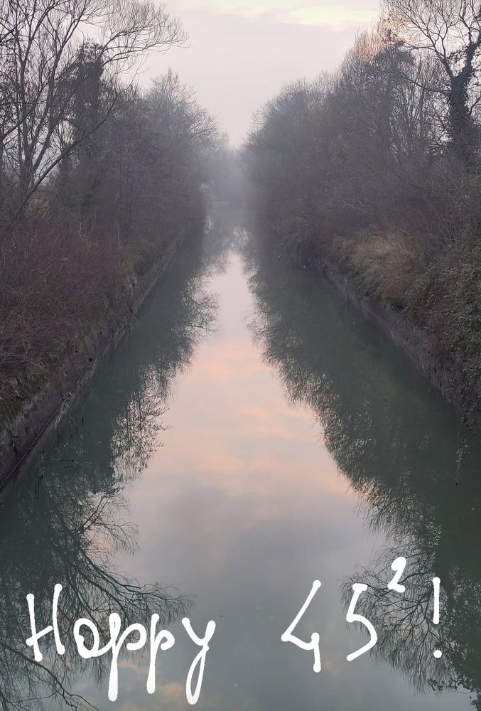 River with trees, annotated with Happy 45^2