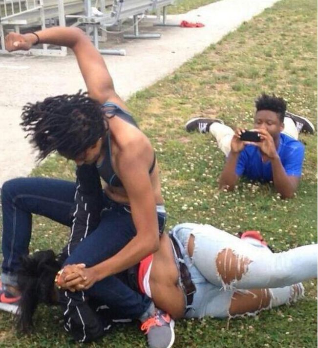 Guy filming a fight meme