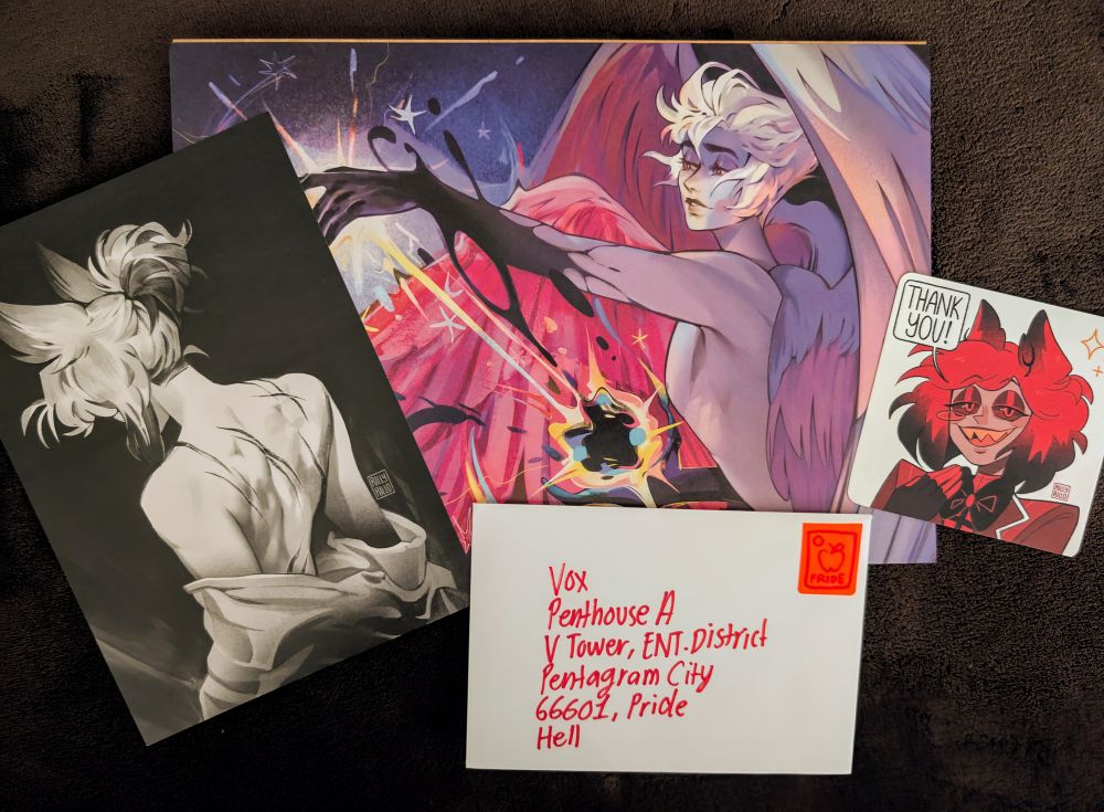 A large and vibrantly colourful A4 print of Lucifer, nude, winged, and creating something beautiful but as of yet unknown;

A black and white A5 print of Alastor from behind, his hair tied up and his shirt falling off his body to reveal his scarred back;

A mini-print of Alastor with a speech bubble saying 'thank you!';

And a small white envelope franked with a red Pride stamp featuring the image of an apple; the address reads:

Vox
Penthouse A
V Tower, Ent. District
Pentagram City
66601, Pride
Hell