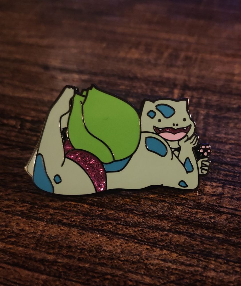Buff Bulbasaur laying on stomach looking so happy