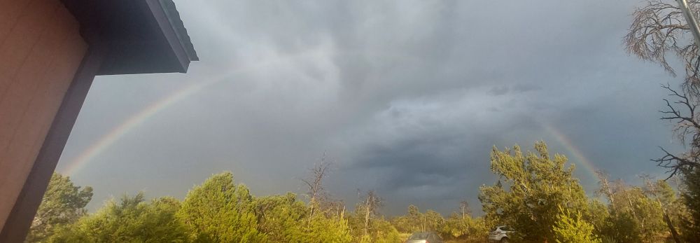 Rainbow through the storm clouds