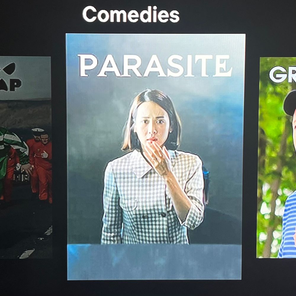 A Netflix menu bookmark for Bong Joon Ho’s acclaimed 2019 film PARASITE under the category heading “Comedies.”