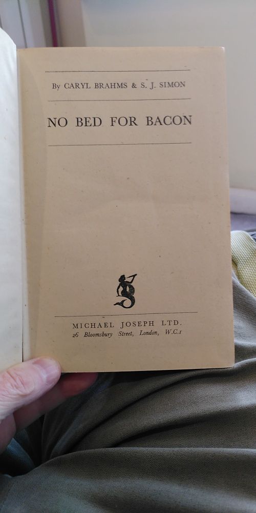 Title page of 'No Bed for Bacon' by Caryl Brahms and S J Simon, published by Michael Joseph in 1941