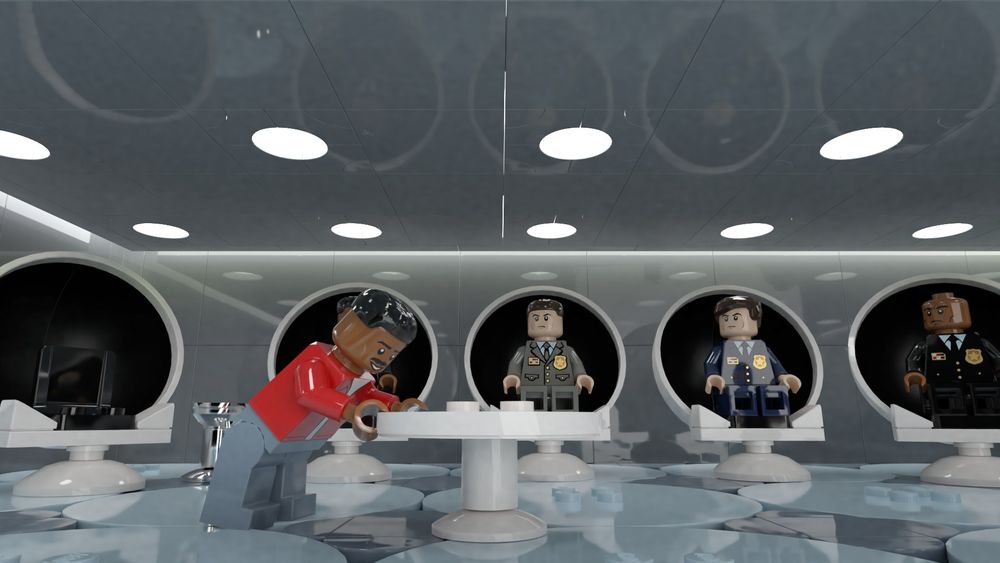 Lego Will Smith dragging a coffee table loudly across the room, perplexing the military guys