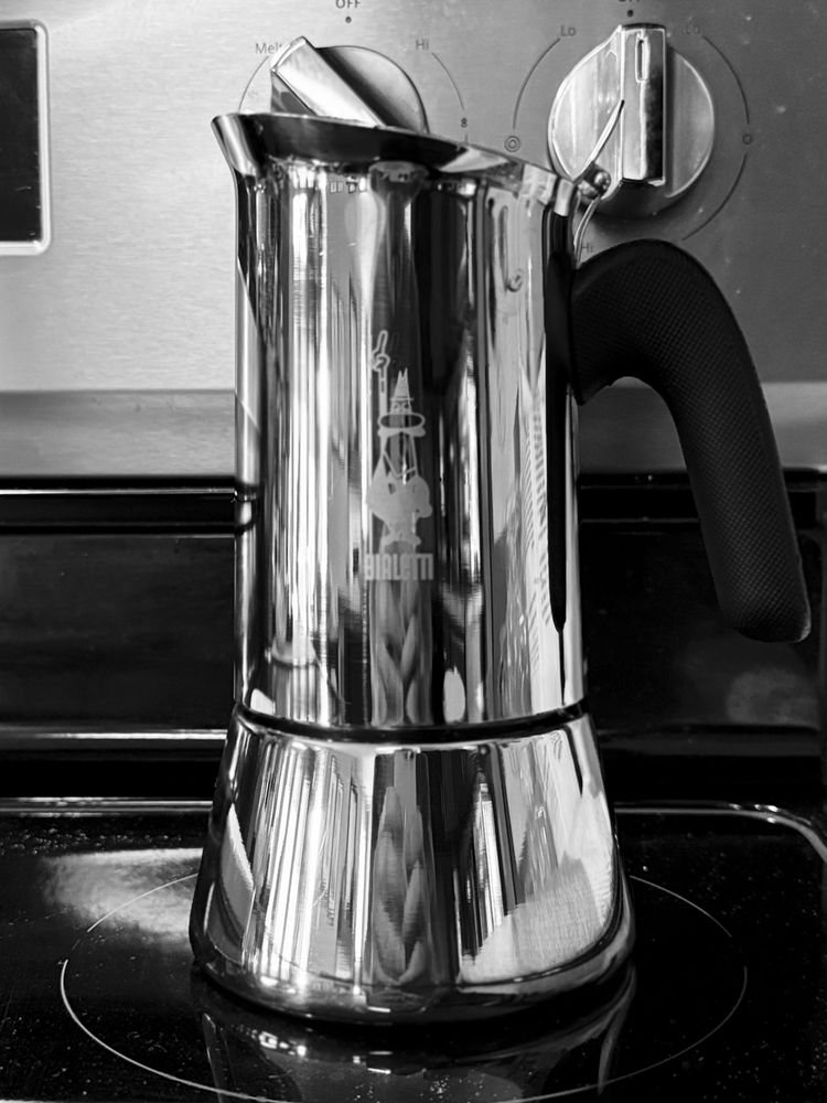Black and white photo of a stovetop espresso maker.