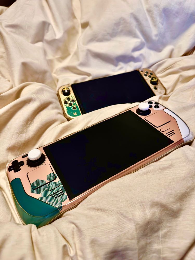Steam Deck 1TB Oled Model paired with the Nintendo Switch Oled Tears of the Kingdom Limited Edition