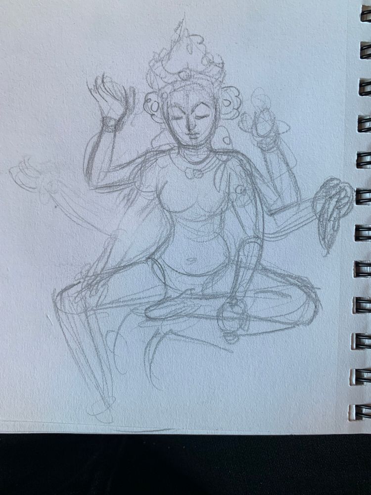 This is a drawing of a beautiful bronze statue that had a lot of small gems on it. 