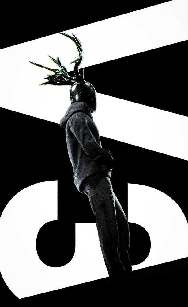 A tall man in black clothing wearing a black motocycle helmet with deer antlers.
Behind the man there is text saying "V3", V means version in this exaple.