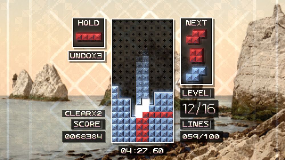 Screenshot from Tetrachroma.

The player hard drops a piece into their stack, close to causing a large line clear.