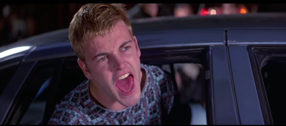 Screenshot from the movie Hackers.

Dade (Jonny Lee Miller) is put into the back of a police car in handcuffs, as he screams "HACK THE PLANET" out of the car window.