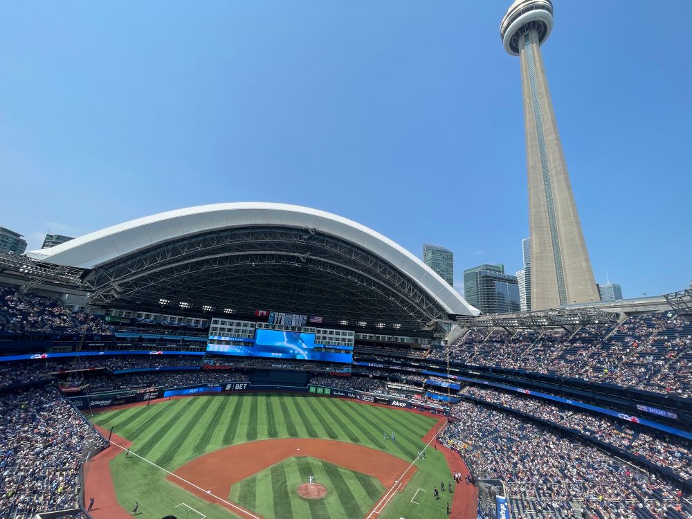 Photo of the Roger’s Center in Toronto, with the CN Tower visible on the right of the photo.
