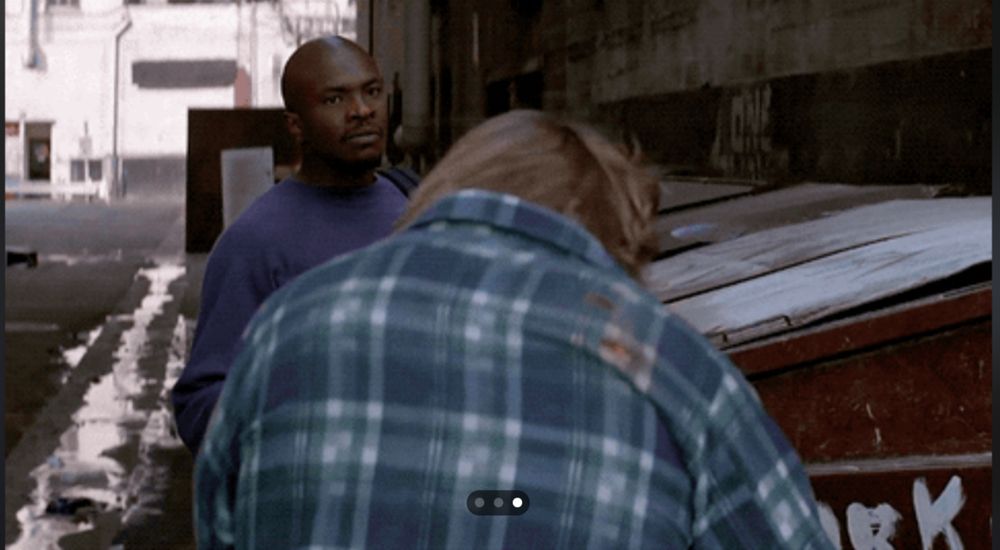 Frank punches John in the original They Live, here juxtaposed to mean he refused to play the game