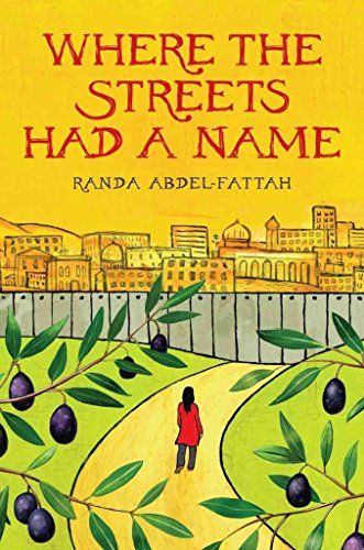 book title "where the streets had a name" by Randa Abdel-Fattah. the book cover is yellow with buildings in the background, plants in the foreground with an individual wearing red walking towards a wall.