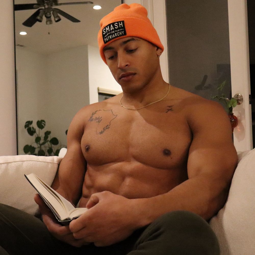 Hot man in a “Smash the patriarchy” beanie 