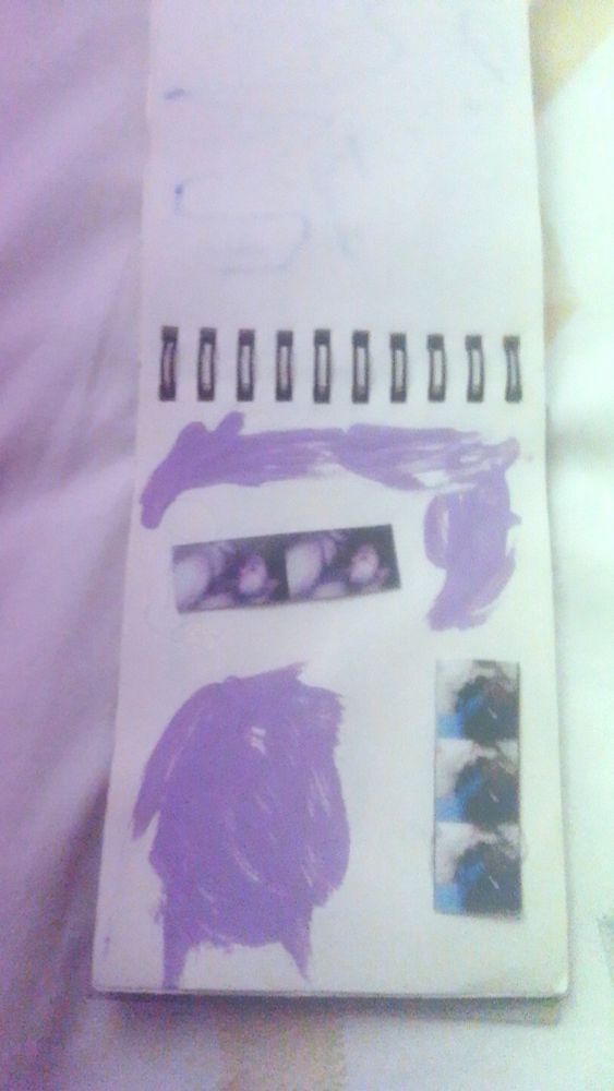 notebook featuring gay oral sex and paint strokes.