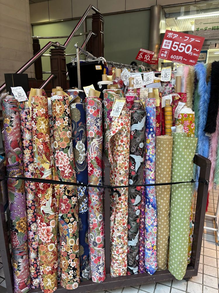 Rolls of colourful Japanese print fabrics. 