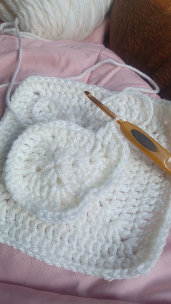 Two crochet Grannie squares which will be turned into a bodice forr the cosplay (there will be more Grannie squares)