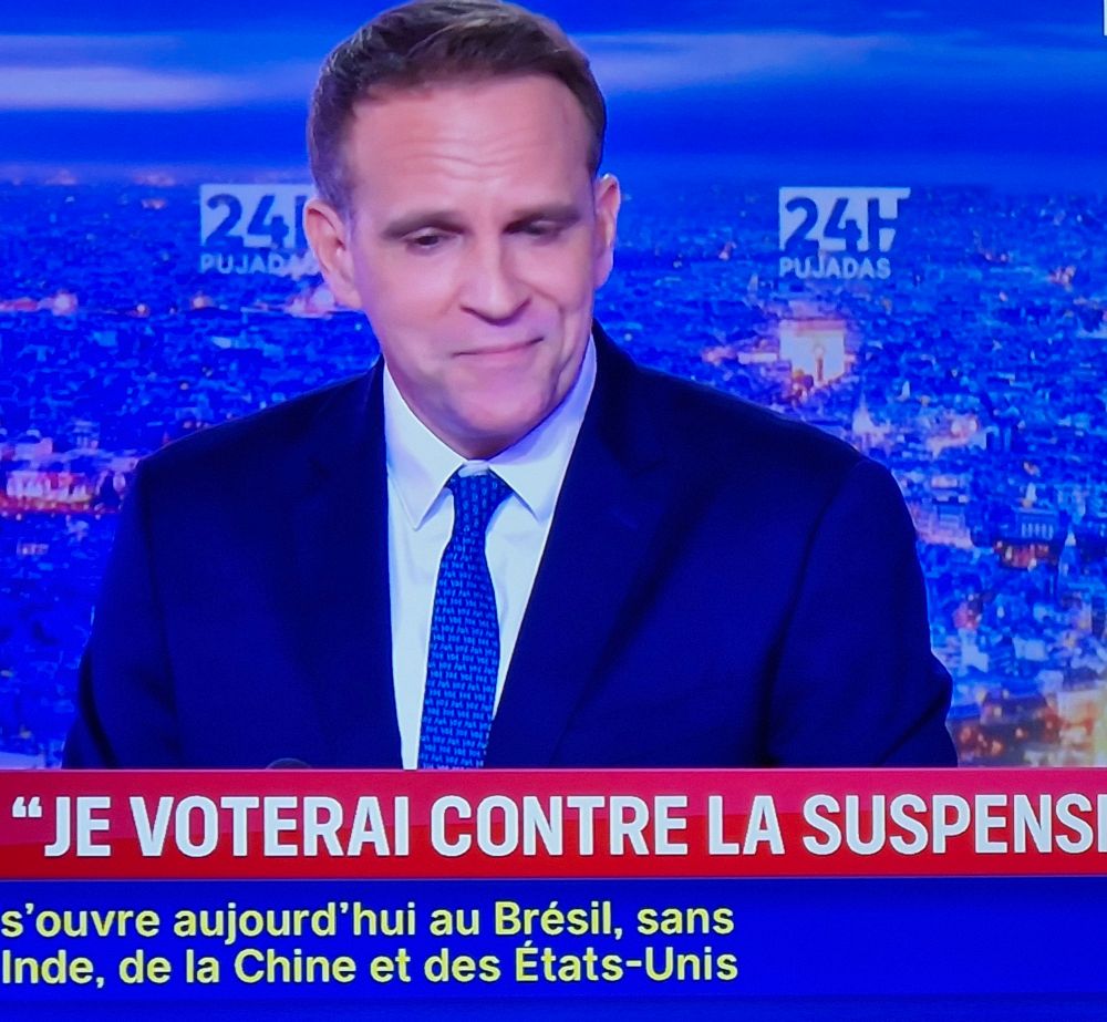 Capture d'écran de la chaine LCI, portrait de Marc Ferraci, le suce boule de Macron.