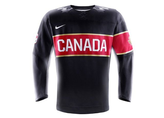 Black Canada sweater made by Nike for the Olympics. It features a single red armband on the left arm. 