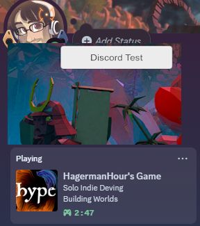Basic Unity Legacy UI Button labeled Discord Test overlayed on a screenshot of the Discord Profile UI, showing the user's profile icon, obscured by the overlay, and then the now playing rich presence  of the indie game being made.