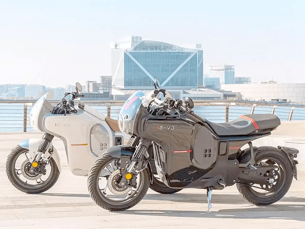 New Honda E-VO Electric Motorcycles in black and white
