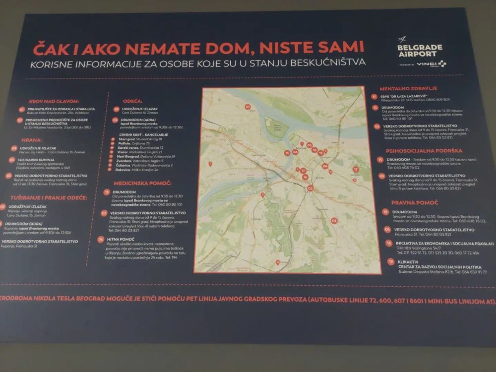 A info poster at the Belgrade airport. The central part is a map from OSM, surrounded by addresses of hospitals and so on.
