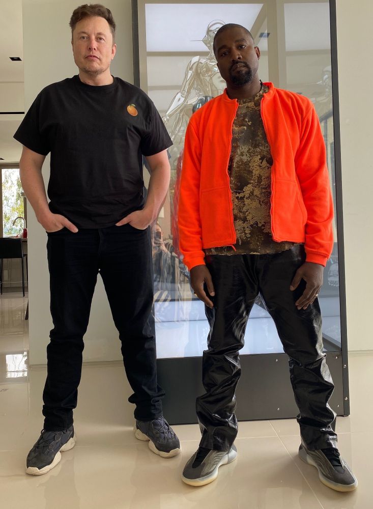 Two Nazis pose
