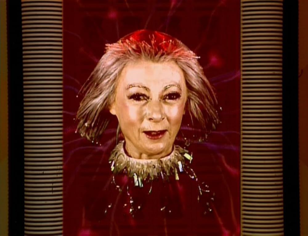 Screencap of Geraldine McEwan as the titular character from Red Dwarf Series 8, Episode 4: "Cassandra".