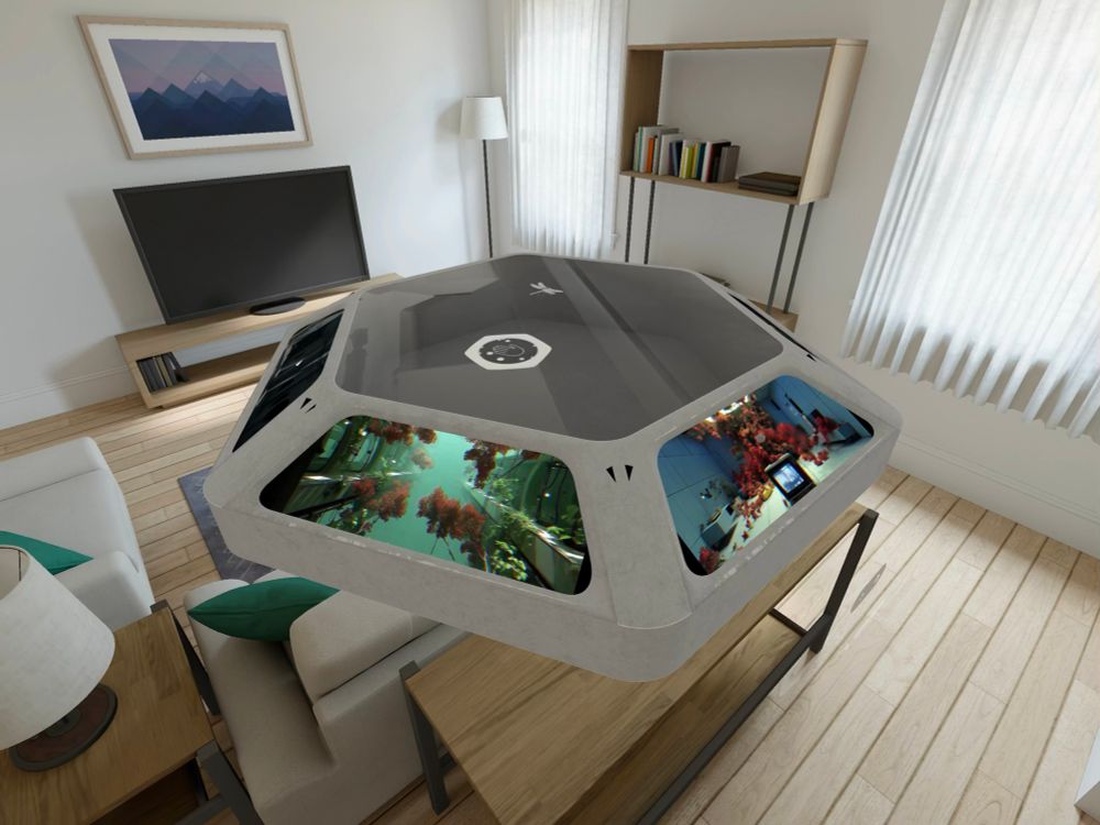 A screenshot of the Hexatable playing videos on the screens, in a simulated environment.