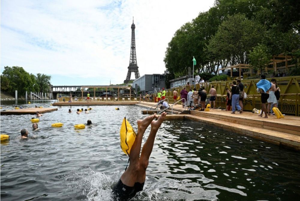 The Seine river with swimmers