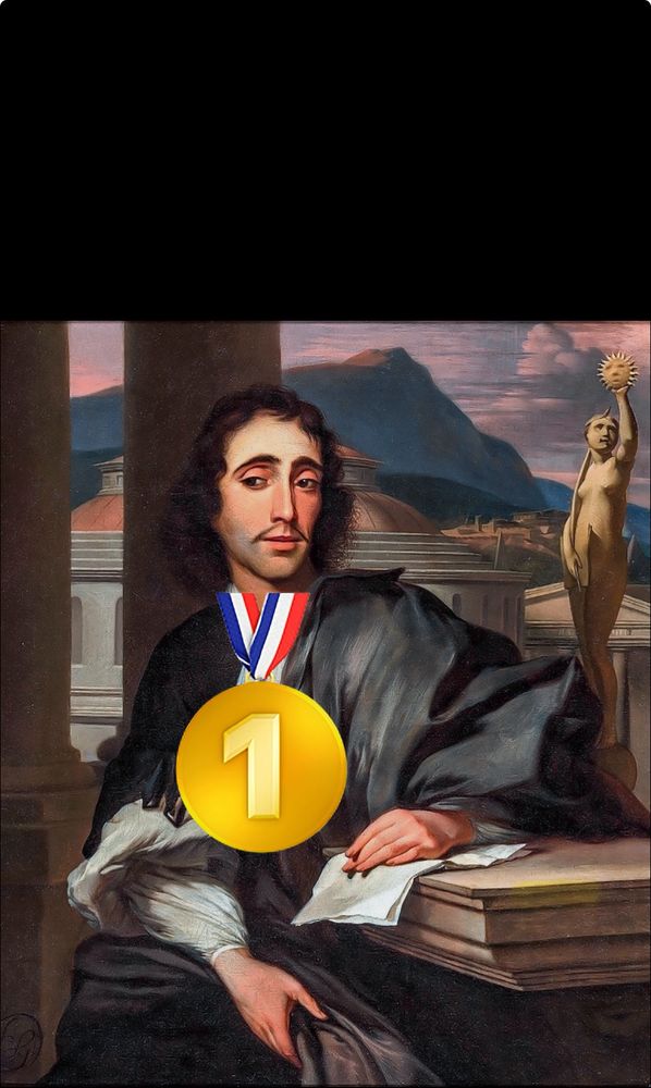 Spinoza, the very special boy, wearing a gold, number 1 medal. 