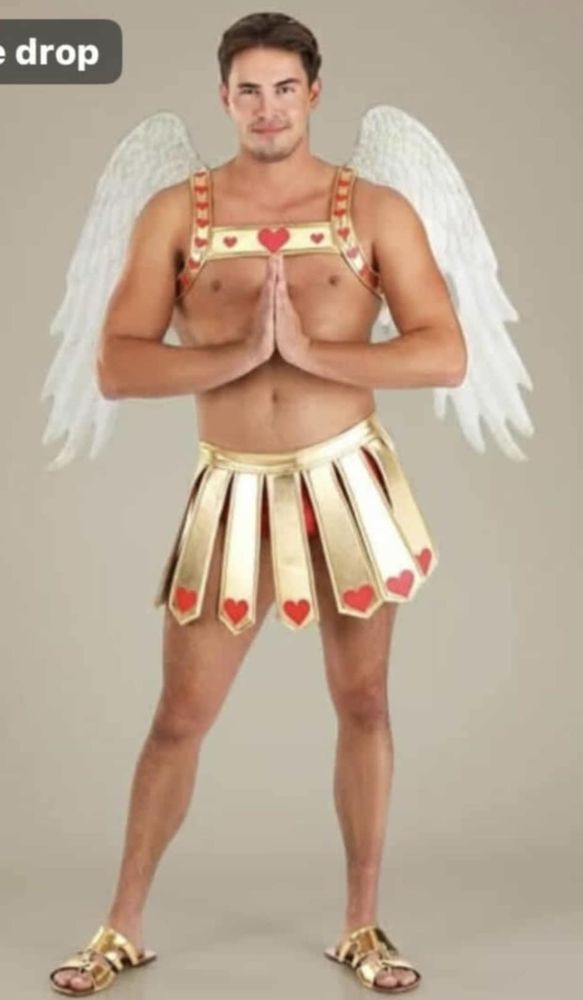A man wearing a cupid costume.