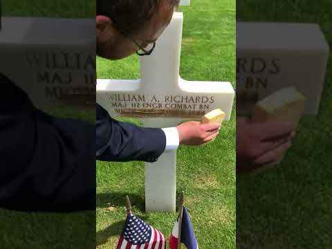 French Caretakers Scrub Sand From Omaha Beach Into The Letters To Give Them The Brown Gold Look