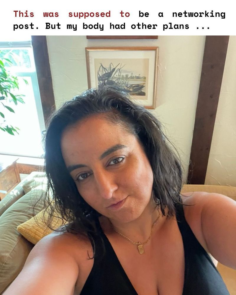 Me in a living room infront of a green couch. There is a picture of a shop in the back. I have my black shoulderlength hair open, looking tired but peacful in the camera. I am wearing a black Vneck Top and small Gold neckless.

Above: This was supposed to be a networking post. But my body had other plans ...