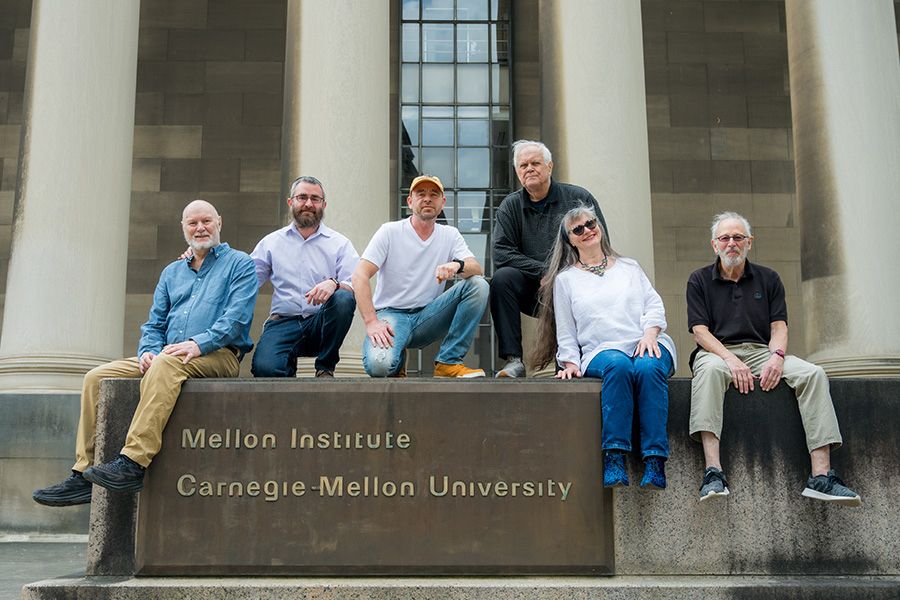 The six founders of Biocognon sit outside of Mellon Institute.