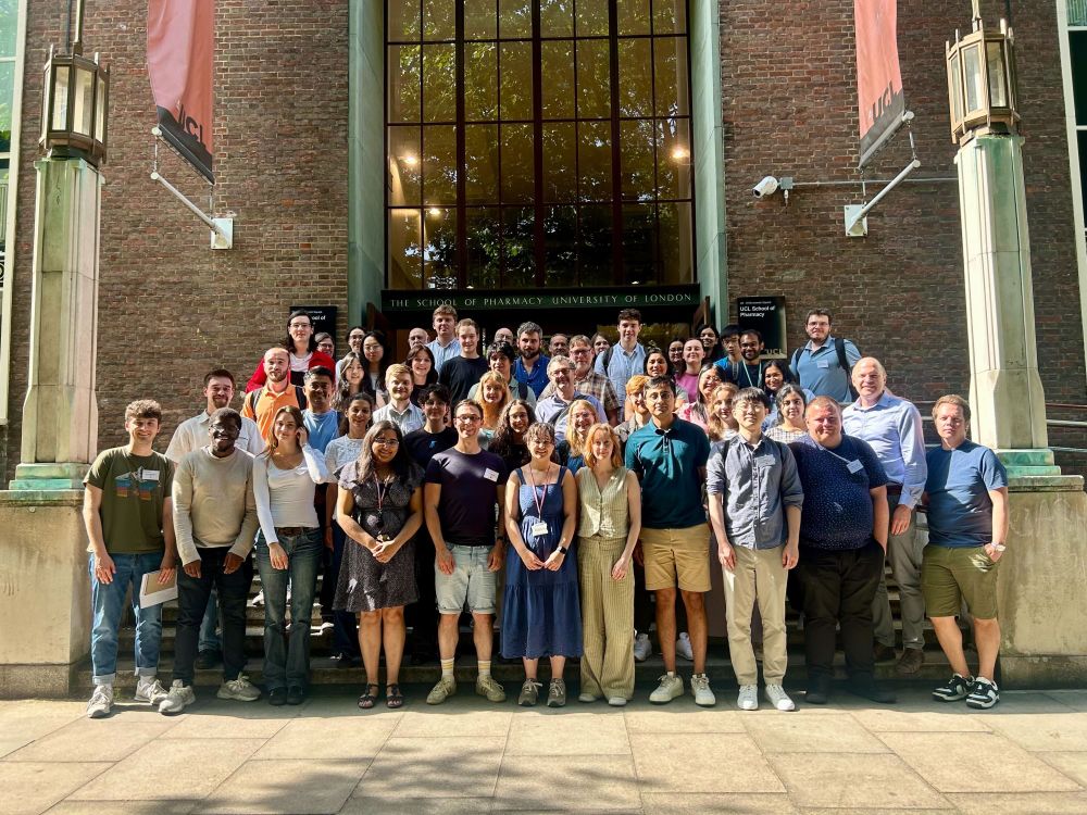 Attendees of the Royal Society of Chemistry NMR Discussion Group postgraduate meeting 2025 standing at the UCL School of Pharmacy entrance