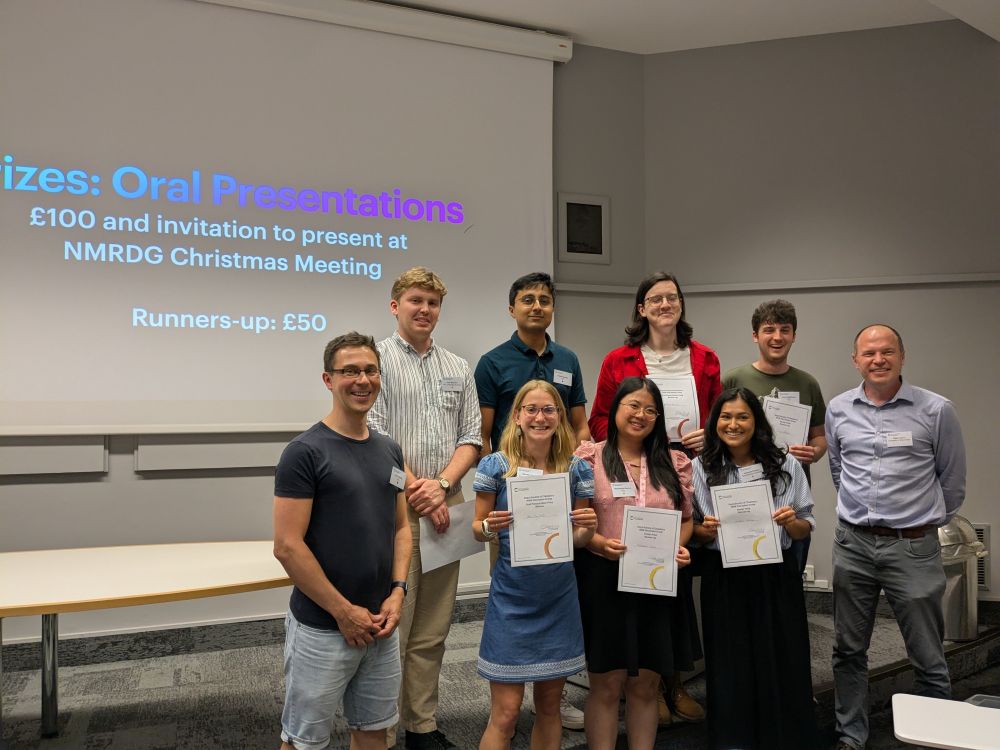 Prize winners from the RSC NMRDG postgraduate meeting. Back row: Jack Bertovici (poster prize winner), Darshil Kapadia (oral runner-up), Katherine Bonham (oral runner-up), James Williamson (poster runner-up), Dr Ralph Adams (NMRDG Secretary). Front row: Dr Chris Waudby (host), Ella-May Hards (oral presentation winner), Meshezabeel Narciso (poster runner-up), Anupama Acharya (poster runner-up).
