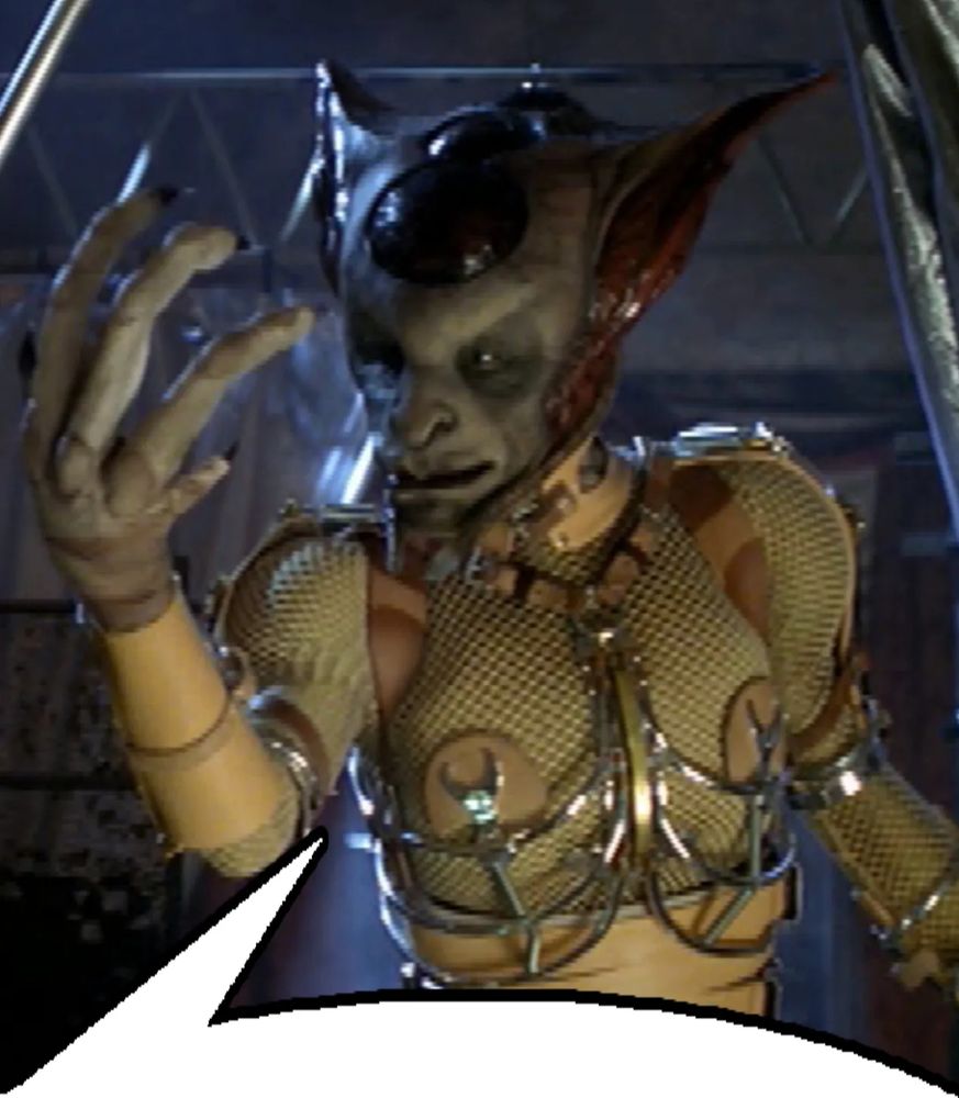 Namtar the bio-mod freak from season one of Farscape, a large creature with external tubes for fluid circulation on his external metal rib scaffolding