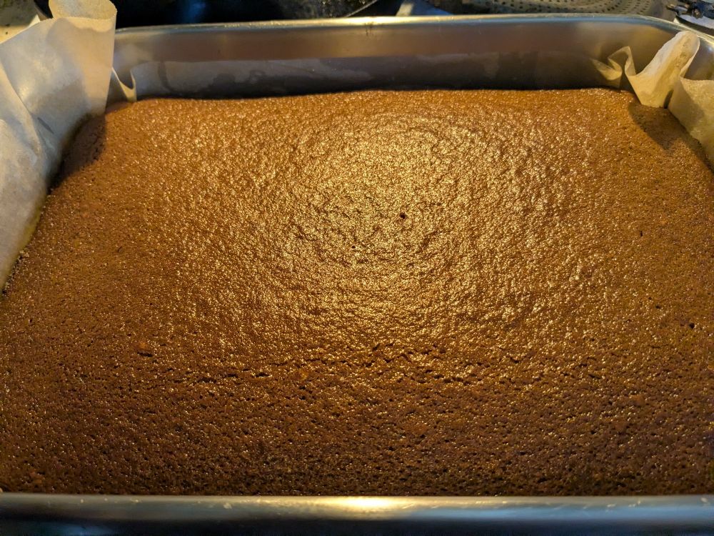 A large slab of gingerbread cooling down. 
