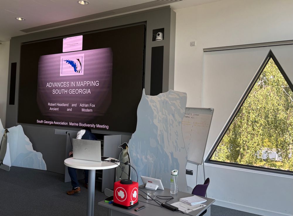An image of the title slide with the text “advances in mapping South Georgia” “Robert Headland and Adrian Fox”
